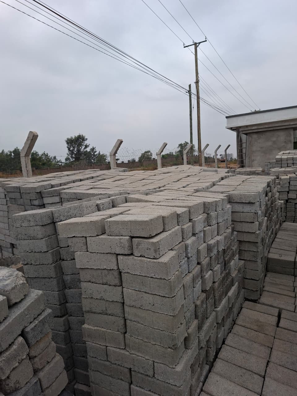 Natural grey rectangular cabro pavers produced in volume for clean, versatile paving layouts