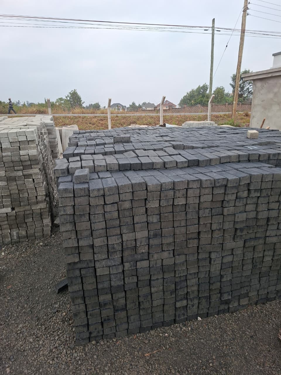 Charcoal rectangular cabro pavers stocked in bulk for contemporary driveways and parking areas
