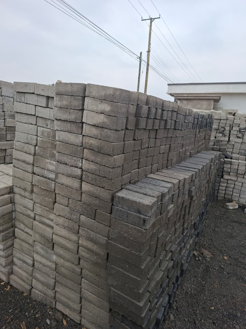 Natural grey rectangular cabro pavers produced in volume for clean, versatile paving layouts