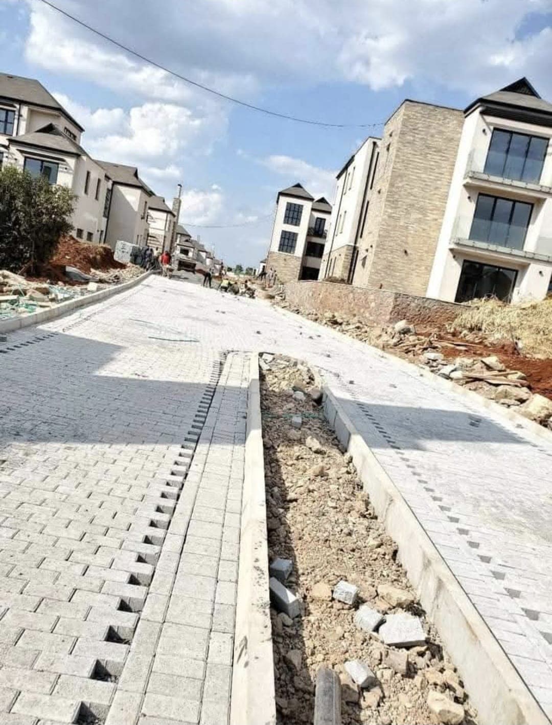 Estate road paved with brick cabro and finished kerbstones