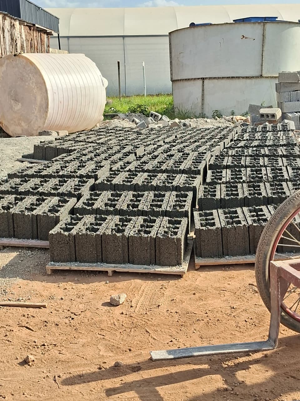 Machine-finished hollow blocks prepared at the production yard.