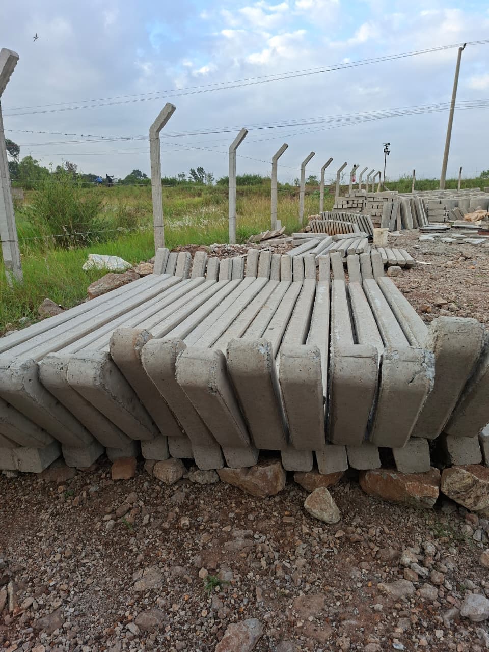 Reinforced posts curing at the yard before delivery