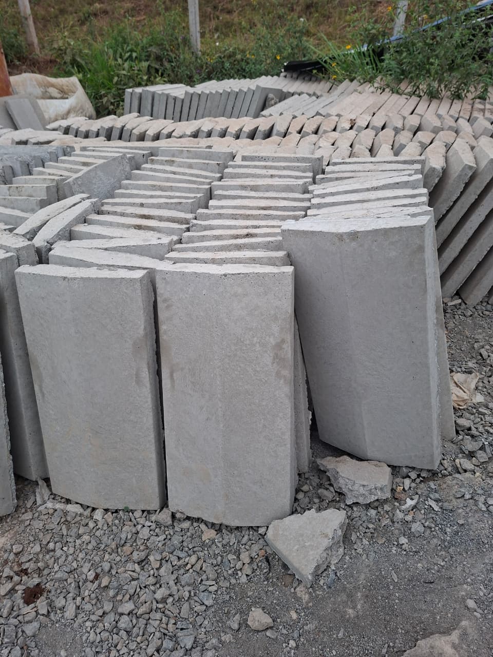 Precast concrete cover slabs in production stock — durable protection for drainage and service channels